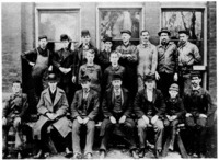 A group of Edison Company workers in the early eighteen-nineties. Henry Ford is the third from the right in the top row.