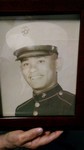 Black and white portrait of U.S. Marine Sam Marquez.