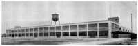 The New Orleans Ford branch assembly factory, a good example of plant construction in the early nineteen twenties, and (below) the Rouge plant about 1928, showing the northern end of the slip at the right, the storage bins at its left, the high line bordering it, and farther left the blast furnaces, foundry, and power plant (tall chimneys).