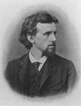 A black and white portrait photograph of Friedrich Ratzel, sitting forward but looking to the left. He has a short goatee and moustache and is wearing a suit, waistcoat, and tie.