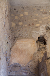 Fig. 3.1. Room 22, north wall, upper zone, left: underpainting of Second-Style scheme. Photo: P. Bardagjy.