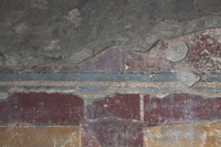 Fig. 1.24. Room 18, east wall, Third-Style frieze. Photo: P. Bardagjy.