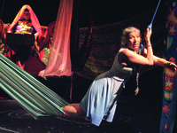 A photograph of a woman on stage, a woman leans forward in a hammock, and a drawing depicting the same moment.