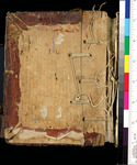 A back cover of a book. The pages are sewn into the book, and the threads are seen on the spine of the back cover. A color bar is placed on the right side. side.