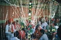 Strands of flowers decorate the mass wedding.