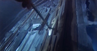 Close-up image of an arrow piercing a surface that has white calligraphy written on it. The scene is blue-tinted.