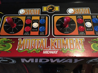 Overhead view of Mortal Kombat joystick and button interface
