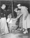 Dr. U Thein, unidentified man, Helen Keller, and Polly Thomson at the Home for the Blind, Rangoon, Burma, 1955.