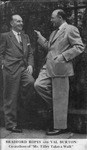 Dust jacket photo depicting two well-­dressed men in suits and ties, looking affectionately at each other and touching knees.