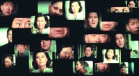 A shot from Home, Sweet Home, showing a montage of many faces on screen.
