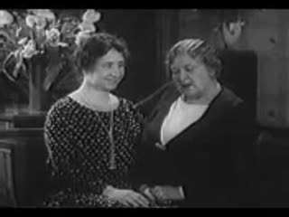 Anne Sullivan Macy explaining Helen Keller's speech
