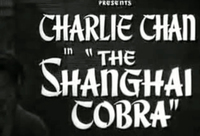 Title screen for "The Shanghai Cobra" in white English font superimposed over a nondistinct and dark background