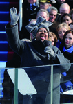 A photo of Aretha Franklin wearing a gray wool fascinator while singing at the inauguration of President Barack Obama in 2009.