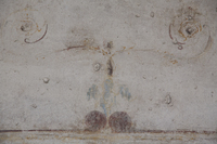 Fig. 21.589. Porticus 60, west wall, panel 2, upper zone, center, vegetal goddess ornament. Photo: P. Bardagjy.