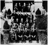 A group of Ford personnel at the Detroit Boat Club, September 17, 1908 Beginning at top, left: figure at the side by potted plant, unknown; John Dodge, John Anderson, Horace Dodge, Frank Kulick, David Gray, C. Harold Wills. Second row: James Couzens, Gordon McGregor, F. R. Fox, Stan Roberts, Norval Hawkins, Henry Ford. Third row: R. M. Lockwood, M. D. Coate, H. B. White, W. C. Anderson, Charles T. Hendy, Jr., H. B. Harper (?). Fourth row: R. P. Rice, Thomas J. Hay, E. R. Stearns, H. J. Cunningham. Front row: L. C. Block, Gaston Plantiff, C. E. Fay, C. C Meade