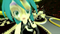 In this hard-core metal version of the _Heart Sutra_ vocaloid Hatsune Miku and her band perform on a platform decorated with what appears to be calligraphic Siddham script, the writing introduced to Japan by master calligrapher Kukai in the 9th century.