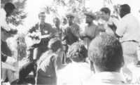 Freedom Summer volunteers join local residents in singing Freedom Songs during the Mississippi Freedom Summer.