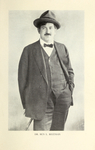 Fig. 35. Photograph of Ben Reitman wearing a suit, bowtie, and hat, holding a cane in his right hand.