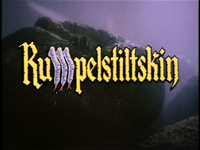 A skull has yellow English title text superimposed over it, with an illustrated claw in the place of the M.