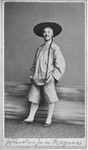 Photograph of Charles T. Parsloe wearing baggy clothes and a hat with long braided hair