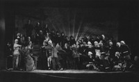 An image of the struggle session scenes from the play The White-­Haired Girl. The mass of peasants, with the white-­haired girl at the front, point in anger at the landlord Huang Shiren, who cowers in fear.