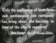 A quote from a German newspaper is typed on the screen with the background image of Hitler
