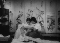 Chinese painting on folding screens with calligraphic writings (poems?), the folding screens several times in this film - it seems like the folding screens are props to complement the static scenes