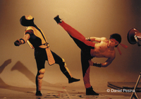 Actors playing Liu Kang and Scorpion fight during the motion-capture process on Mortal Kombat II