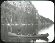 Cornelia “Fly Rod” Crosby fishes from an E. M. White canoe on Moosehead Lake in Maine, ca. 1895.