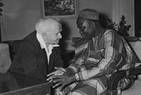 Photograph of Premier Akintola with Isreali Prime Minister, Ben-Gurion, leaning forward in their chairs to converse with one another.