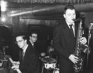 Fig. 1. Three members of the jazz group the Bobby Laine Trio, circa 1950 (Bobby Laine, tenor; Dominic Jaconetti, drums; Howie Becker, piano), performing at the 504 Club, which was located at 504 W. 63rd St. in Chicago.