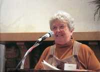 Color photograph of Lewis at age 74, speaking at President of Appalachian Studies Association Conference held in north Georgia in her honor.