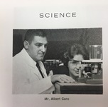 Black and white photograph of Mr. Albert Caro with a beaker.