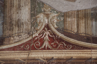 Fig. 1.14. Triclinium 14, east wall, detail of vegetal goddess in pediment. Photo: P. Bardagjy.