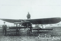 Aviator Albert Guillaud standing atop his Blériot XI monoplane before to his flight at the Kolomianskoe aerodrome.