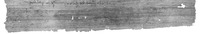 Papyrus fragment containing two lines of Greek writing.