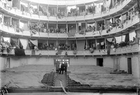 Photograph of families displaced after 1922 who were temporarily housed in theater boxes in Athens