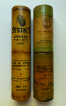 Photograph of two greasepaint sticks, one labeled “No. 16 Chinese” and the other “No. 26 Japanese”