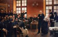 An oil painting of a large space resembling a classroom, with two tall windows. The focal point is the standing figure of Charcot, a middle-aged man in a suit and bow tie, with one finger raised as he appears to lecture to a large group of seated men. To his left, a young woman in a long dress with an open neckline stands, partially collapsing backward with her eyes closed. A younger man catches her under the arms, and an older woman holds out her arms to assist. The seated men who observe the scene are dressed in black suits with white shirts. Some wear white aprons, and several appear to be taking notes or sketching.