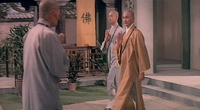 Calligraphy on a hanging banner in a Shaolin Temple, says "Buddha"