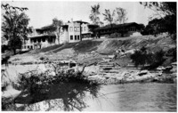 Fair Lane nearing completion. In the foreground, the dam is in process of construction.