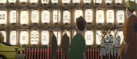 A cartoon scene of people walking by rows of bright lanterns with calligraphy.