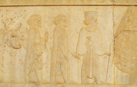 Tribute reliefs on the Apadana at Persepolis, also painted at Susa, depicting ambassadors with gifts being led to the Persian king with a hand-on-wrist gesture.