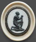 A ceramic image of Josiah Wedgwood’s antislavery medallion. A kneeling, enchained black man against a white background. Around the edge is written, “Am I not a man and a brother?”
