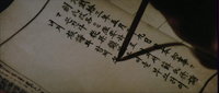 Close-up of writing in a book, with a combination of han'gul and Chinese characters.
