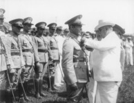 Batista receiving a medal from President Carlos Mendieta Montefur sometime in 1934 or 1935. Standing at strict attention, third from left, is José Pedraza, Batista's second-in-command.