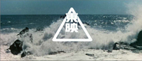 Toei Studio logo, white calligraphy over a background of crashing waves.