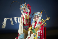 Figure 13: Photograph titled The Dialogue at the Green Mound, by National Center for Traditional Arts GuoGuang Opera Company.