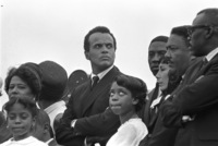 Longtime financial supporter and King family friend Harry Belafonte walks with other mourners during the funeral procession for Martin Luther King in Atlanta, April 9, 1968.