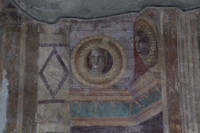 Fig. 2.5. Atrium 5, west wall, center, detail of imago clipeata. Photo: P. Bardagjy.